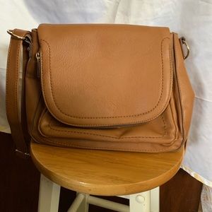 brown faux leather bag